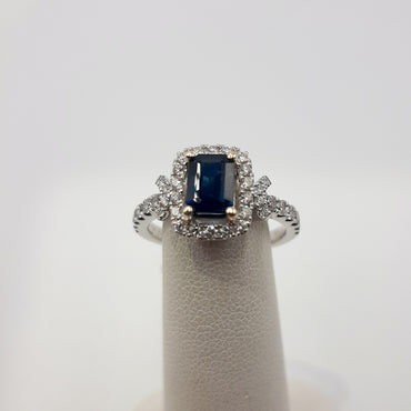 14kt white gold ring featuring a 1.10 carat Natural Sapphire and .54 carats of natural diamonds