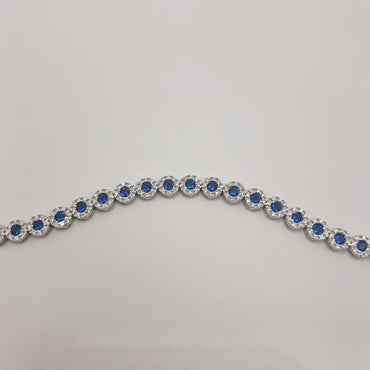 Sterling silver fashion trending bracelet Featuring synthetic sapphire and white cubic zirconium