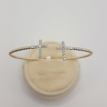 14kt yellow gold diamond stackable/ flexible cross bracelet