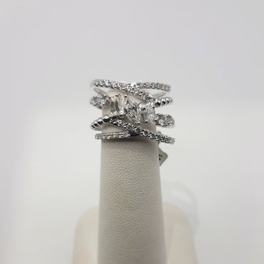 14kt white gold fashion trending ring featuring crossover style with 1.50 carats of natural diamonds