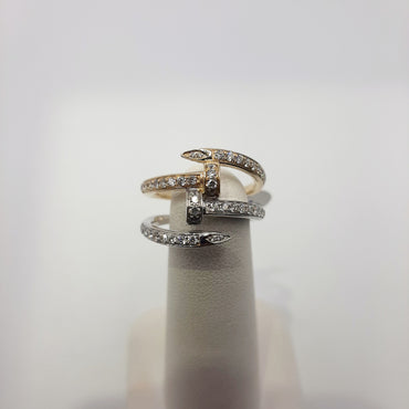 14kt yellow and white gold double nail ring featuring .63 carats of natural diamonds