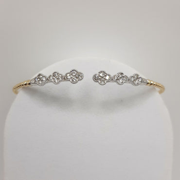 14kt yellow gold stackable and  flexible bracelet featuring .53 carats of natural diamonds