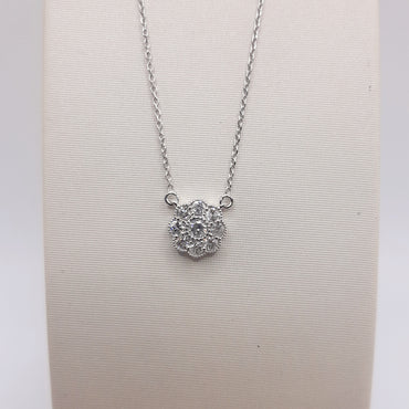 14kt white gold cluster necklace featuring .34 carats of diamonds  on 18