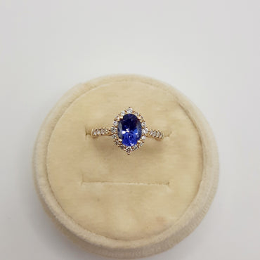 14kt yellow gold 1.12 carat & Tanzanite ring featuring .37 carats of natural diamonds