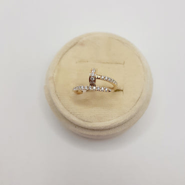 14kt yellow gold nail ring featuring .61 carats of natural diamonds