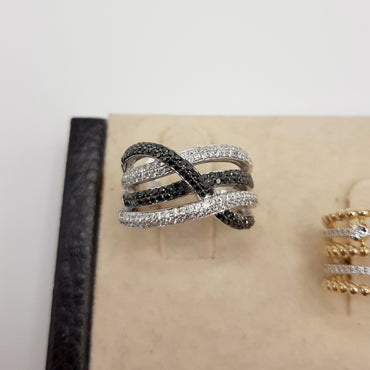 14kt white gold band featuring 1.0 carats of natural black and white diamonds