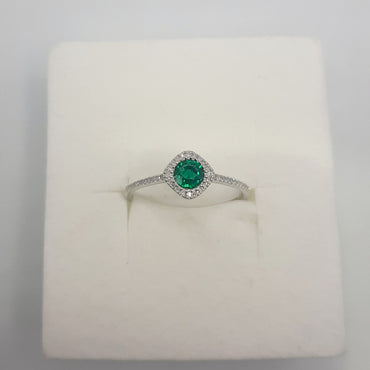 Sterling silver lab grown .41 carat emerald and .012 natural diamond ring