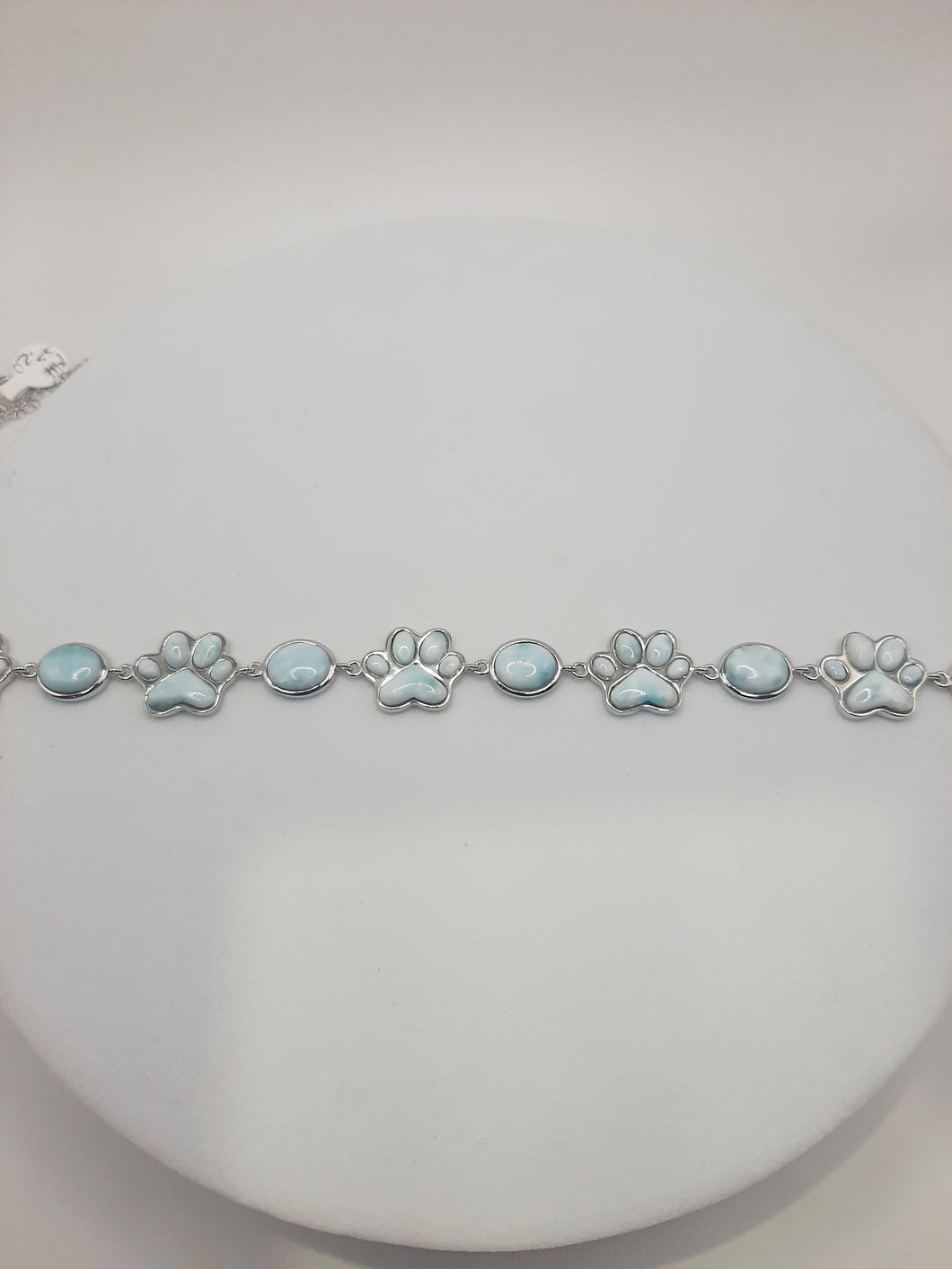 Sterling silver alternating oval and paw print Larimar bracelet 