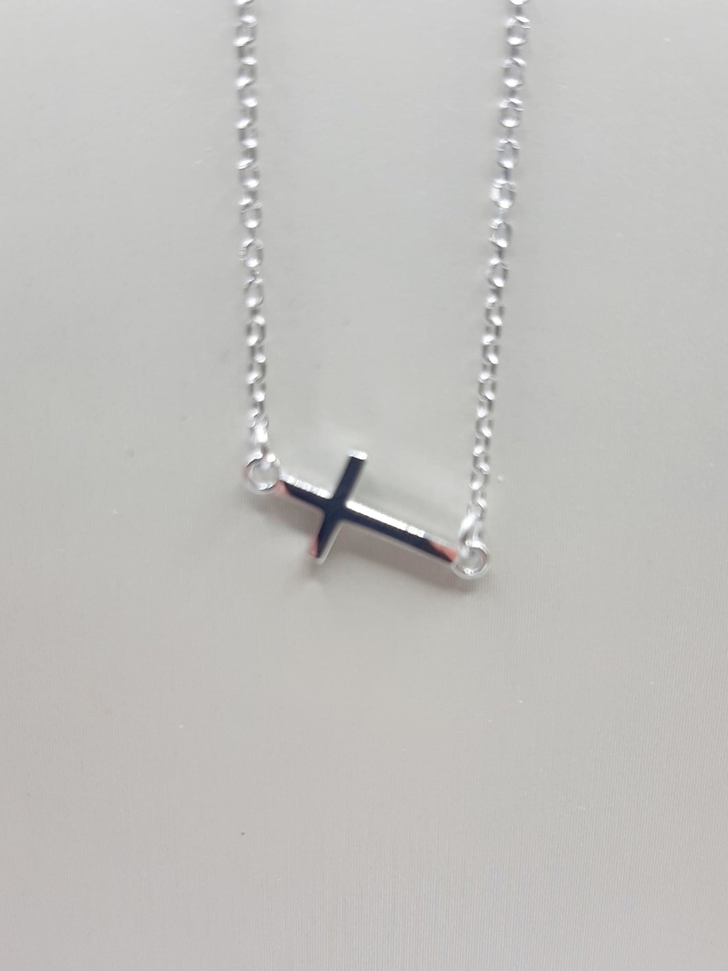 14kt white gold sideways cross necklace on 16