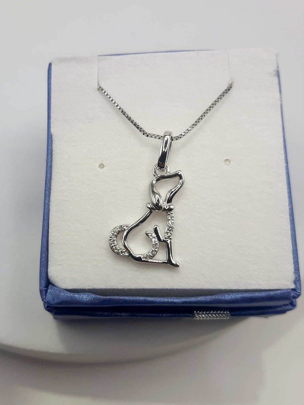 Sterling silver dog pendant featuring white topaz necklace