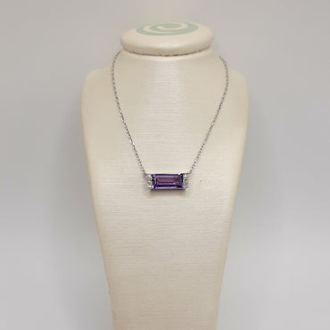 14kt white gold east to west necklace featuring .49 carats of amethyst and .03 carats of diamonds