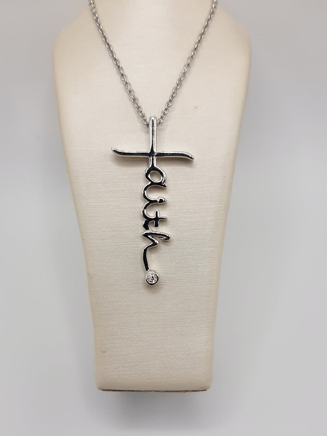 Sterling silver Faith necklace featuring .02 carats of natural diamonds on an adjustable 18