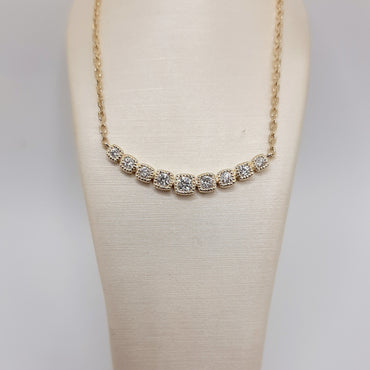14kt yellow gold bar necklace featuring .25 carats of natural round diamonds