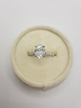 Load image into Gallery viewer, 14kt White Gold 1.60 Carat Oval Lab Grown Diamond with a Hidden Halo and Lab Grown Diamonds on Side Shank
