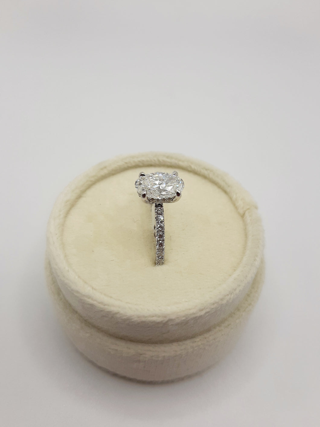 14kt White Gold 1.60 Carat Oval Lab Grown Diamond with a Hidden Halo and Lab Grown Diamonds on Side Shank