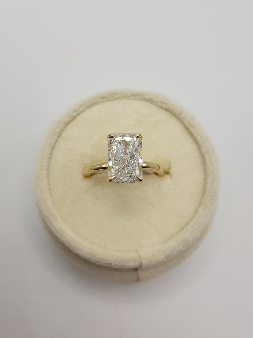 14kt Yellow Gold 3.11 Carat Radiant Cut Lab Grown Diamond with a Hidden Halo