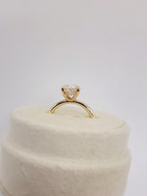 Load image into Gallery viewer, 14kt Yellow Gold Four Prong 2.0 carat Oval Cut Lab Grown Diamond with a Hidden Halo Ring
