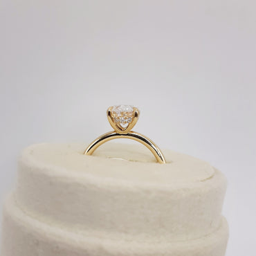 14kt Yellow Gold Four Prong 2.0 carat Oval Cut Lab Grown Diamond with a Hidden Halo Ring