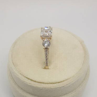 14kt yellow gold three stone engagement ring