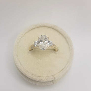 14kt yellow gold three stone engagement ring