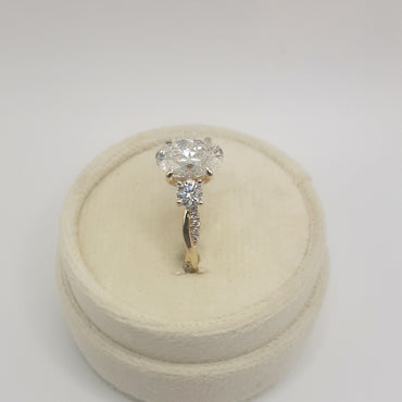 14kt yellow gold three stone engagement ring