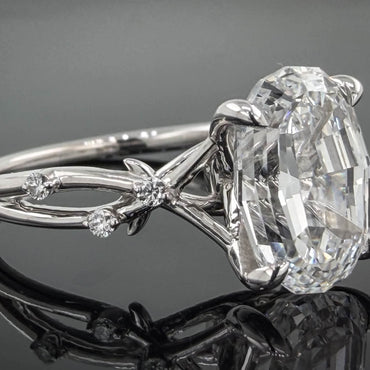 14kt white gold step cut oval lab diamond with a vine shank ring