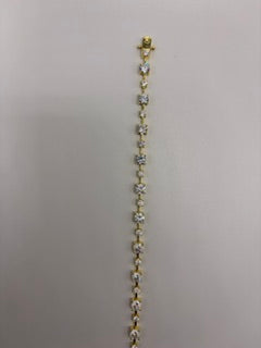 Sterling silver and yellow gold plate tennis bracelet