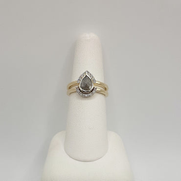 14Kt Yellow Gold Natural Diamond Wedding Set featuring a .64 Carat Pear Shape Salt and Pepper Diamond with and Additional .18 Carats of Natural Diamonds on Band