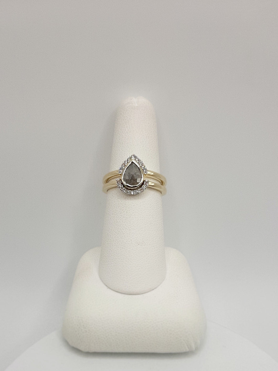 14Kt Yellow Gold Natural Diamond Wedding Set featuring a .64 Carat Pear Shape Salt and Pepper Diamond with and Additional .18 Carats of Natural Diamonds on Band