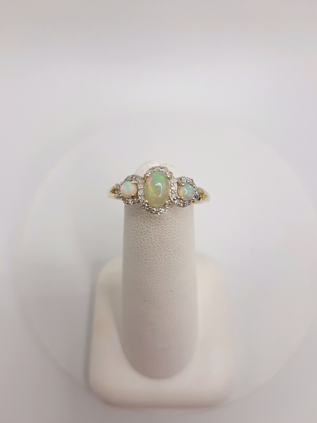 10kt Yellow Gold Three Stone Ring Featuring Opals and .14 carats of Diamonds