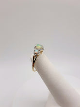 Load image into Gallery viewer, 10kt Yellow Gold Three Stone Ring Featuring Opals and .14 carats of Diamonds
