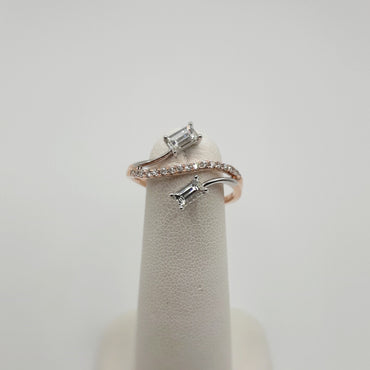 14Kt Two Tone Rose and White Gold Fashion Bypass Ring Featuring .46 Carats of Diamond Baguettes and .153 Carats of Round Brilliant Cut Diamonds
