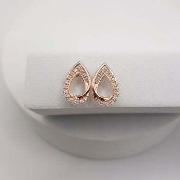 10Kt Rose Gold Post Earrings Featuring .16 Carats of Natural Diamonds