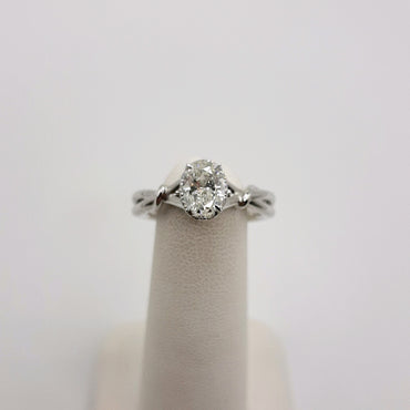 14Kt White Gold Solitaire Ring Featuring a .83 Carat Oval Diamond