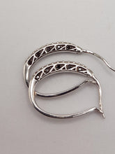 Load image into Gallery viewer, 10Kt White Hoop Earrings Featuring .40 Carats of Both White and Black Diamonds
