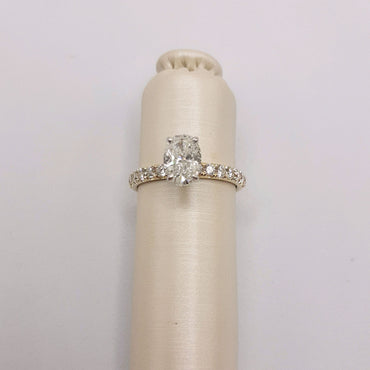 14Kt Yellow Gold Oval 1.04 Carat Diamond Solitaire with Hidden Halo and .55 Carats of Prong Set Diamonds on Shank
