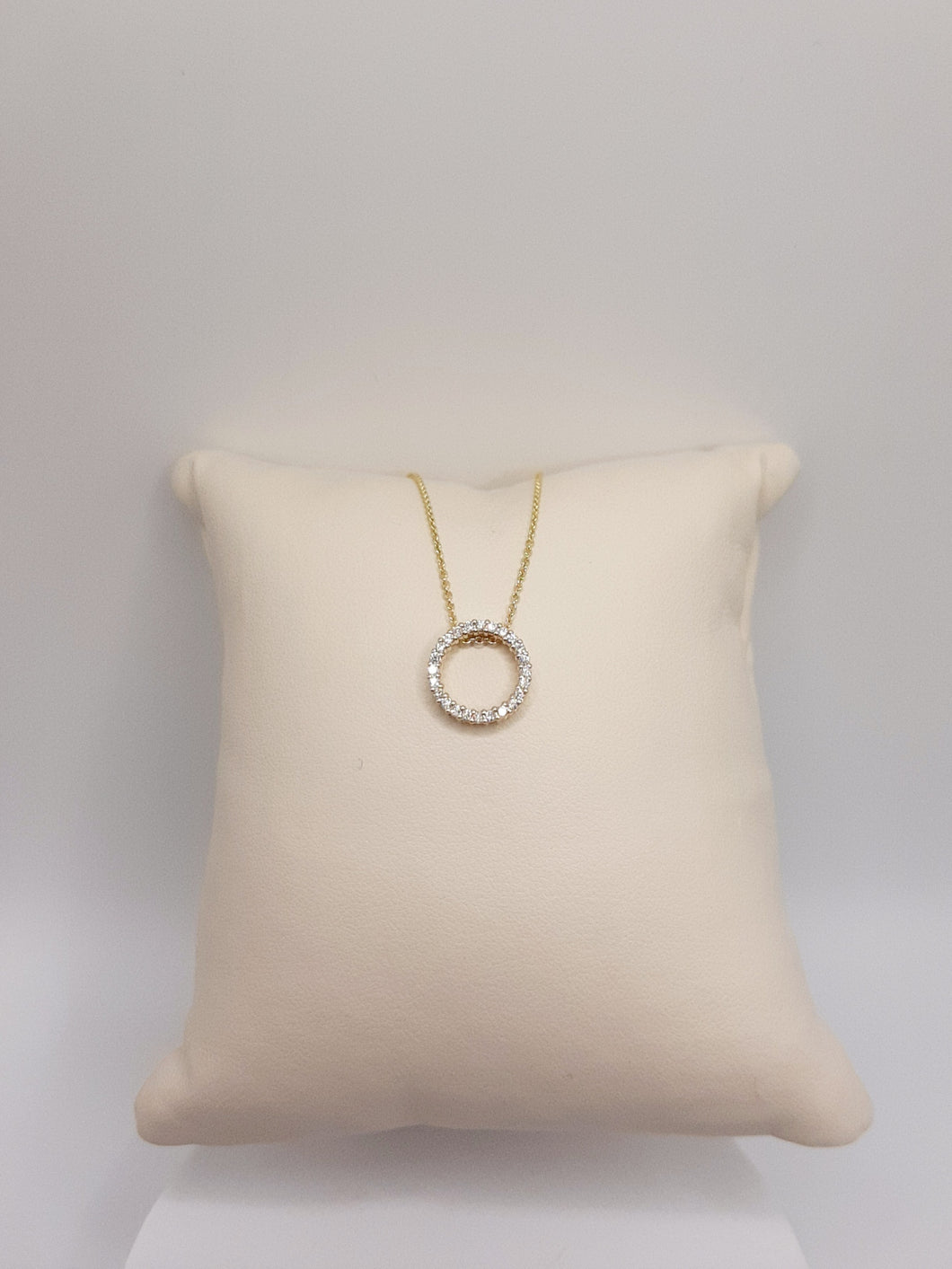 14Kt Yellow Gold Circle Necklace featuring .25 Carats of Round Brilliant Cut Diamonds on an adjustable 16-18