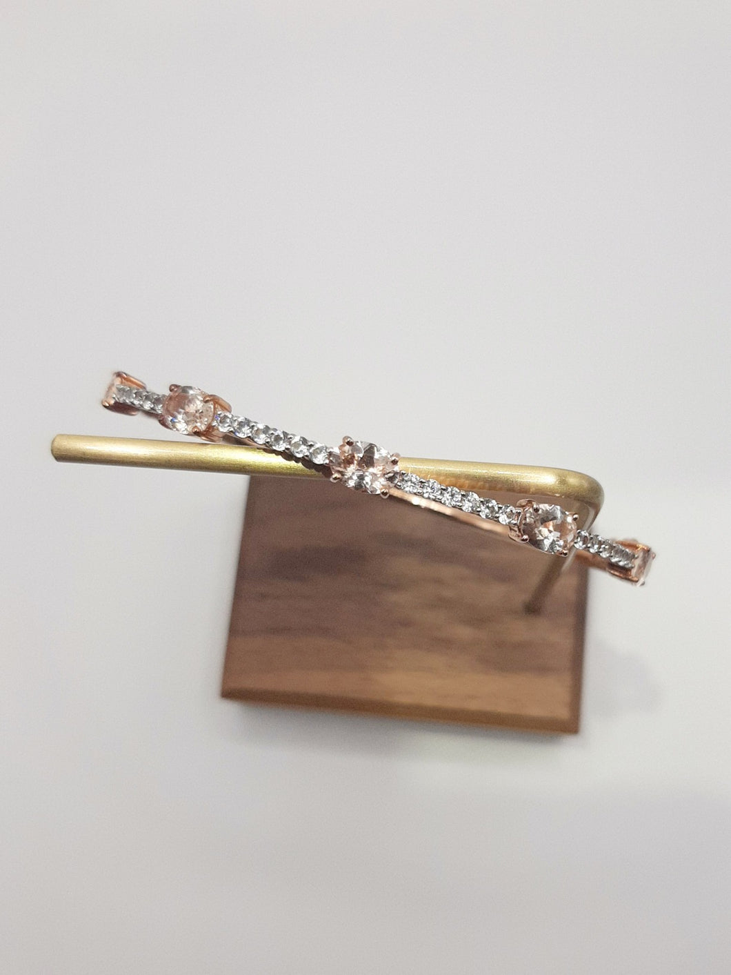 Sterling Silver and Rose Gold Plate Hinged Bangle Featuring Morganite and Created White Sapphires