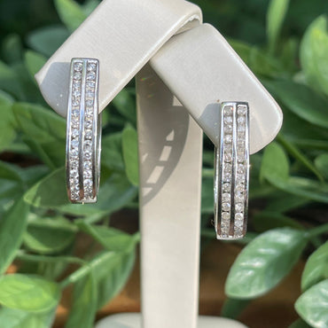 Sterling silver diamond hoop earrings. 1.0 double row channel set